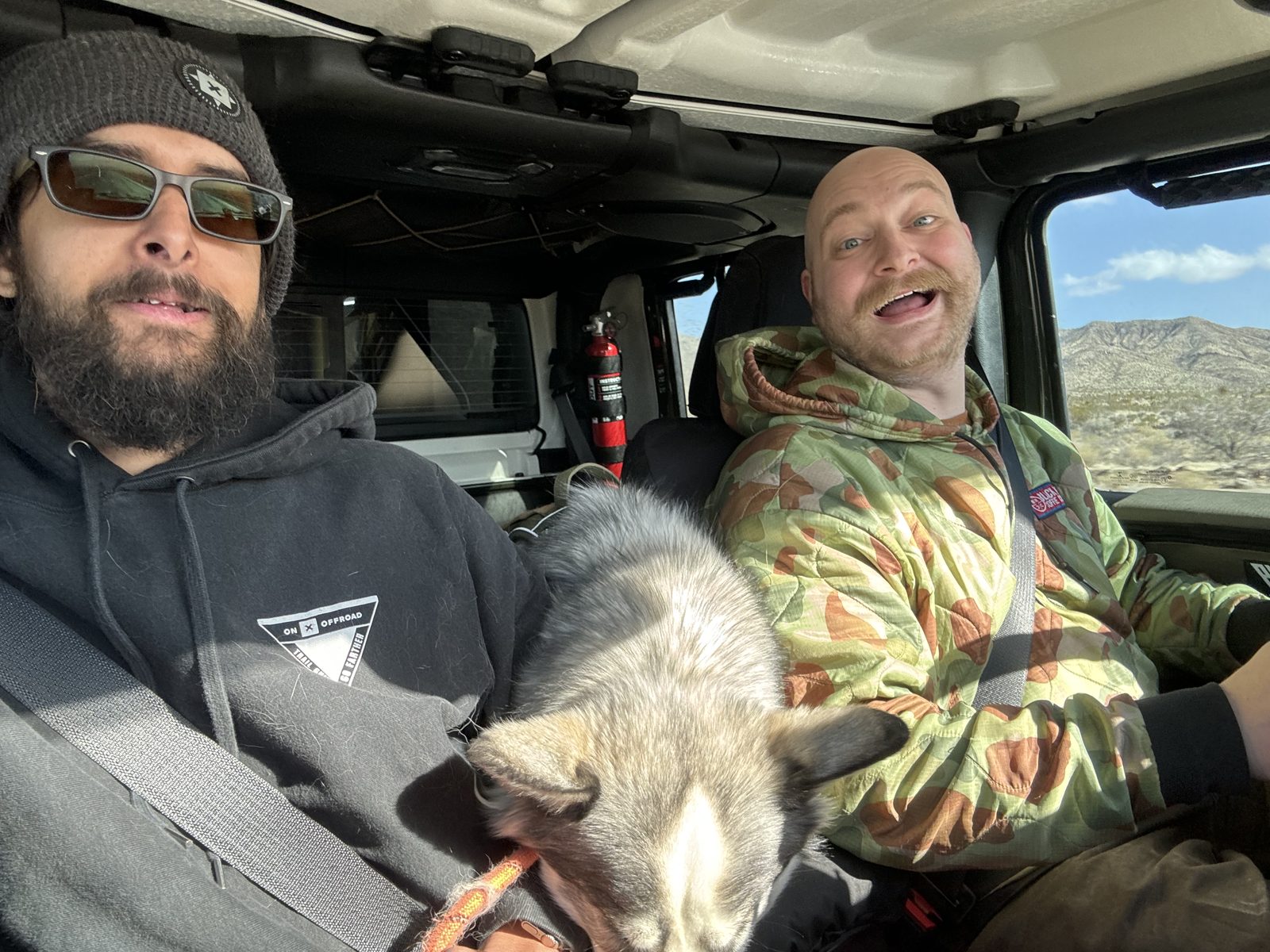 Erik and Eric in the Jeep with Zuzu between them