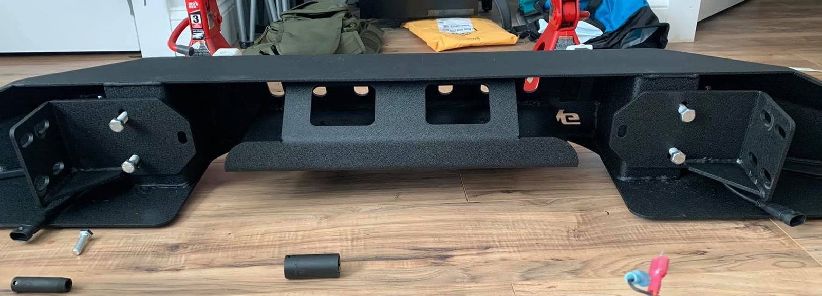 Back of the EAG bumper with both Jeep brackets flipped horizontally and bolted on