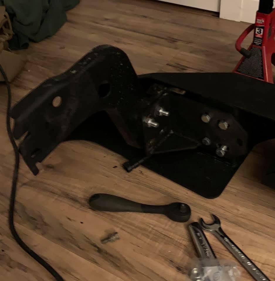 A Trooper bumper bracket bolted to the flipped Jeep bracket on the back of the EAG bumper
